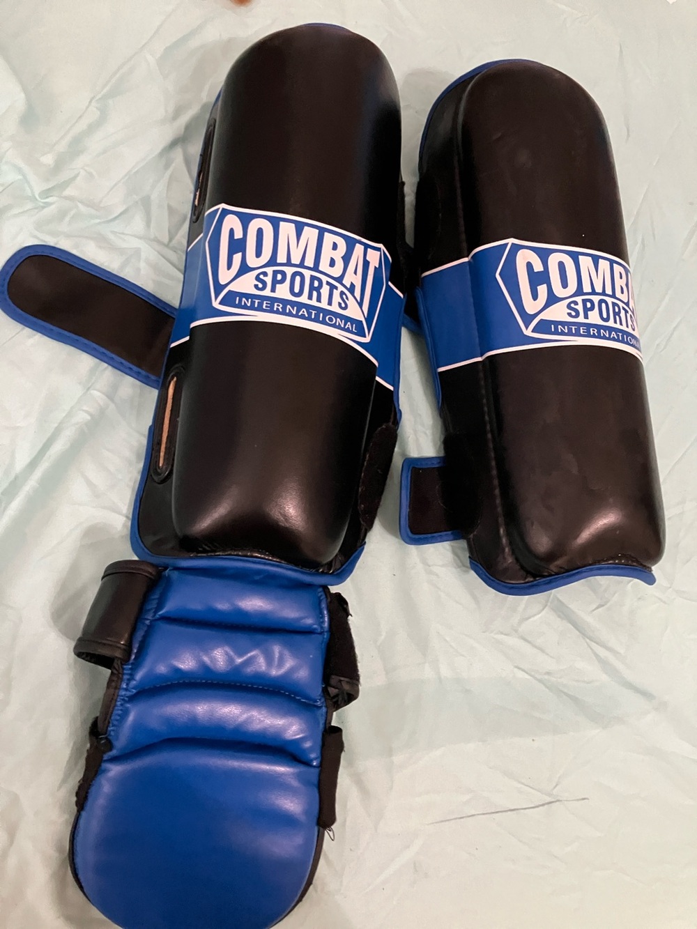 Blue and Black Shin Guards